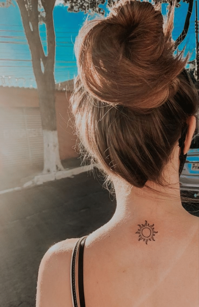Sun with minimalist rays on back of the neck
