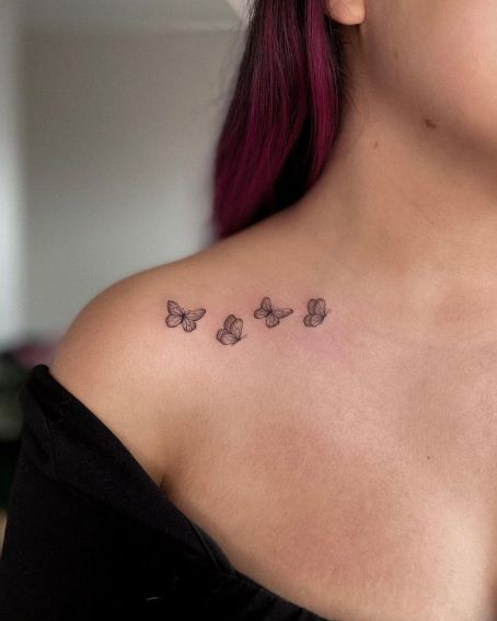 Tiny butterfly on the shoulder blade